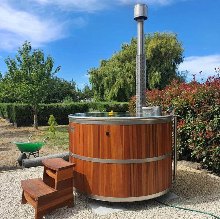 Wood-fired burner and electric heating system, outdoor spa