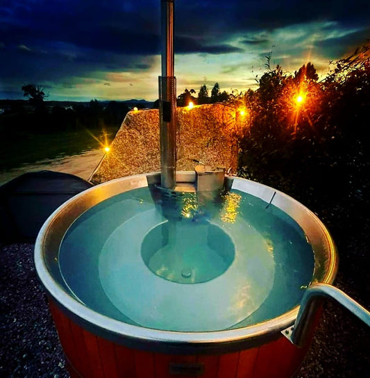 Wood-fired burner and electric heating system, outdoor spa