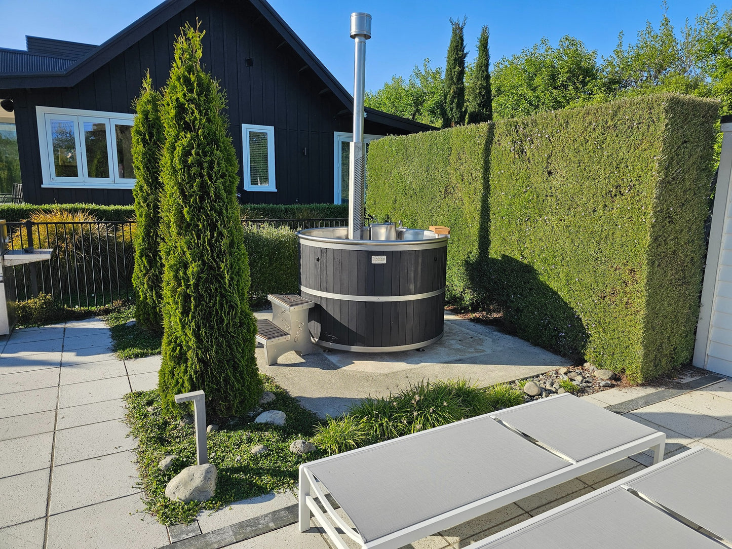Wood-fired burner and electric heating system, hybrid outdoor spa
