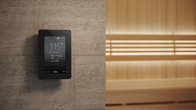 The Helo Rocher 70 Elite Sauna Heater features a sculptural round design with 100 kg stone capacity for soft, drop-like steam. Includes Elite controller.