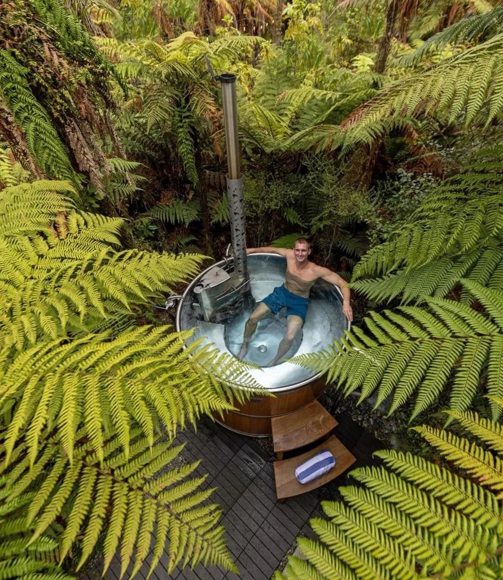 Scandinavian design wood-fired hot tub with timber cladding